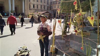 17 صورة ترصد احتفالات الأقباط بأحد السعف في الكنيسة المرقسية