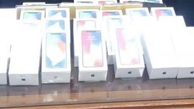 إحباط تهريب ٣٢ هاتفا بحوزة أمريكي بمطار القاهرة