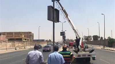 أعلام الجمهورية تزين شوارع مدينة نصر احتفالا بالعيد وكأس العالم (صور)