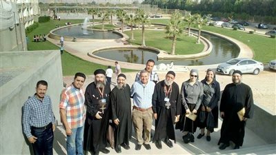 بالصور.. القمص بيشوي يشارك في المؤتمر الثاني لتطوير التعليم بقنا