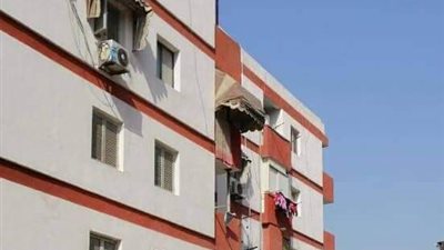 استمرار العمل بطلاء المنازل بحي المناخ في بورسعيد (صور)