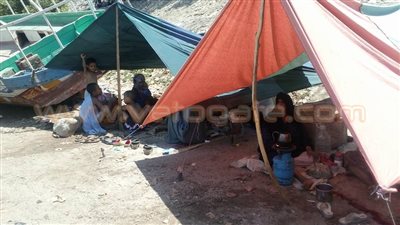 بالصور.. زوار القناطر الخيرية يخيمون على ضفاف النيل