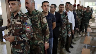 رجال الأمن يصوتون في انتخابات برلمان إقليم كردستان العراق (صور)