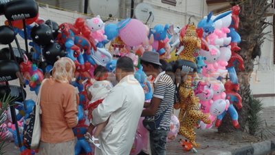 بالصور.. أهالي بورسعيد يحتفلون بالعيد في الشوارع والميادين
