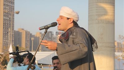 التهامى يتألق بروحانياته في حفل معرض الكتاب (فيديو وصور)