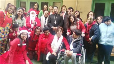 النائب البطريركي للكاثوليك يحتفل برأس السنة مع ذوي الاحتياجات