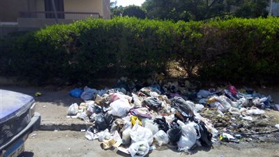 القمامة تحاصر المدرسة الصينية وتهدد الحي الـ «11» بمدينة 6 أكتوبر