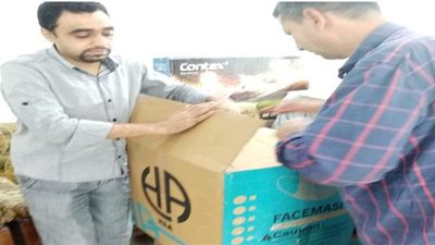 المنطقة الصناعية بالإسماعيلية توفر 4 آلاف كمامة لطلبة المدارس