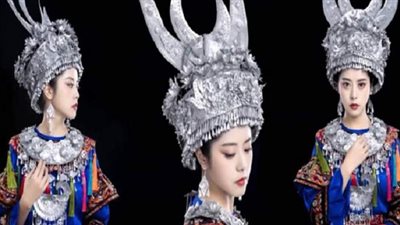 فتاة صينية تصمم قطعا فنية باستخدام مخلفات علب الصفيح