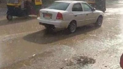 توافد أهالي المحلة على لجان انتخابات النواب وسط هطول أمطار غزيرة | صور