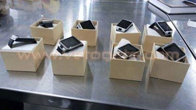 بالصور..ضبط 8 ساعات تجسس داخل طرد بمطار القاهرة