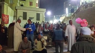 بالصور.. توزيع الطعام وحلوى الأطفال أبرز احتفالات مولد رجبية زين العابدين