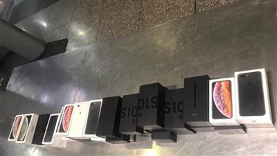 ضبط هواتف بنصف مليون جنيه مع راكب بمطار القاهرة