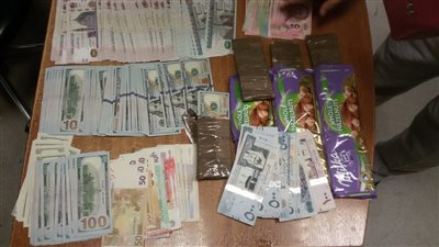 ضبط خزينة أموال بحوزة راكبة في مطار القاهرة