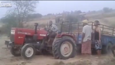 انقسام جرار إلى نصفين في محاولة لسحبه (فيديو)