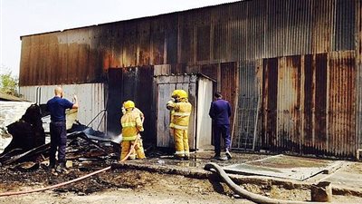 انتداب المعمل الجنائى لبيان سبب حريق مخزن سباكة بالوراق