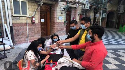 كنيسة الأنبا بيشوي ببورسعيد تساعد الناخبين  على معرفة لجانهم | صور