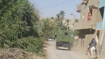 تفاصيل مداهمة قوات الأمن لعزبة الجناين في أسيوط (صور)
