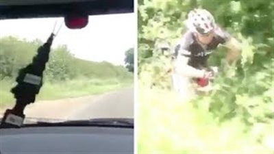 لقطات صادمة لراكب سيارة غاضب يشن هجوما وحشيا على دراج (فيديو)