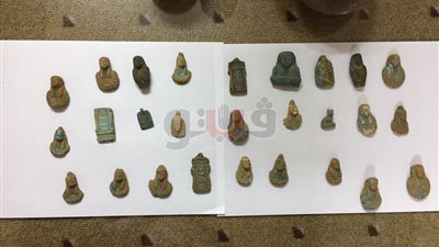 حبس صاحب بازار بأسوان ضبط بحوزته قطع أثرية بأسوان (صور)