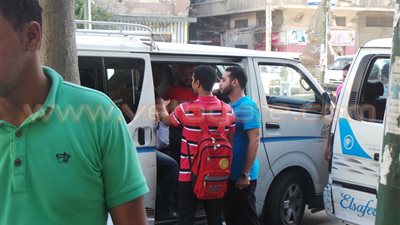 بالصور.. ميكروباصات لنقل جماهير الأهلي لاستاد برج العرب