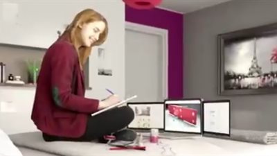 غطاء لاب توب يمنحه شاشتين إضافيتين (فيديو)