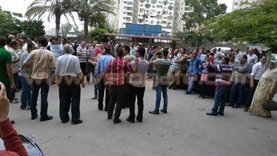 العاملون بالتنظيم والإدارة: مستمرون في اعتصامنا لتجاهل مطالبنا