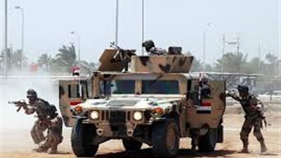 القوات العراقية تطوق بلدة جنوبي الموصل