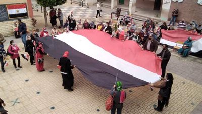 مسيرات بالإعلام لحث الناخبين على الإدلاء بأصواتهم في الإسكندرية