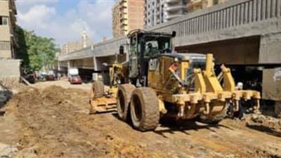 إصلاح ماسورة مياه بشارع ترعة الزمر بالعمرانية | صور