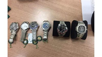 إحباط تهريب 6 ساعات روليكس بحوزة راكب في مطار القاهرة | صور