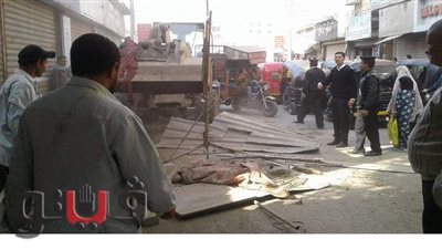 إزالة ورفع 504 تعديات على أرصفة شوارع الواسطى ببني سويف