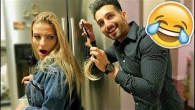 بالفيديو.. رد فعل فتاة قص حبيبها شعرها