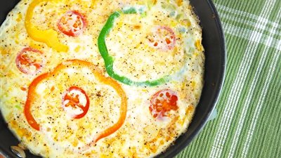 طاجن البيض بالطماطم والفلفل والكريمة على طريقة الشيف نيفين