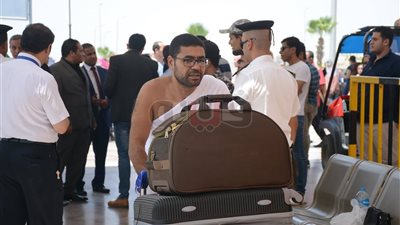 20 صورة ترصد توافد الحجاج على مطار القاهرة