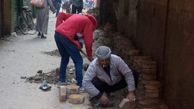 تركيب بلاط إنترلوك بشارع الغريب وإصلاح ماسورة في العجوزة | صور