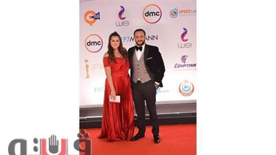 بفستان أحمر.. هنادي مهنا مع زوجها أحمد خالد صالح في ختام 