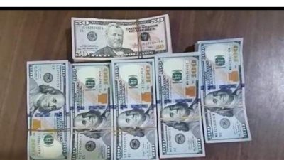 ضبط راكب حاول تهريب 56 ألف دولار داخل حقائبه بمطار القاهرة