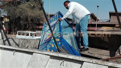 بالصور.. حملة لرفع إشغالات ميدان الجيزة وشارع البحر الأعظم