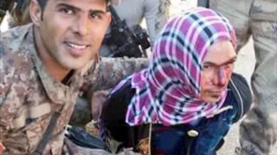 بالصور.. مقاتلو «داعش» يهربون بملابس النساء من الرمادى