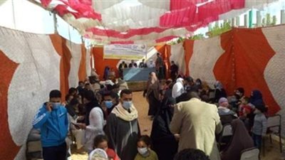 قومي السكان بالبحيرة ينظم قافلة شاملة بقرية الدواجن