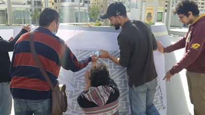 طلاب جامعة حلوان يشاركون في تجميل المتحف القومي للحضارة | صور