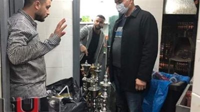 إغلاق 11 كافيه ومصادرة 95 كرسيا في حملة بحي الدقي | صور