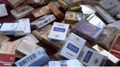 ضبط 23 ألف عبوة سجائر ومعسل مجهولة داخل محل بالجيزة
