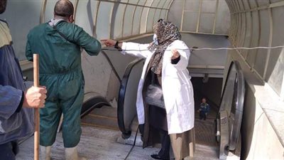 تعقيم الهيئة العامة للكتاب وبنك القاهرة في حملة تطهير بالجيزة | صور