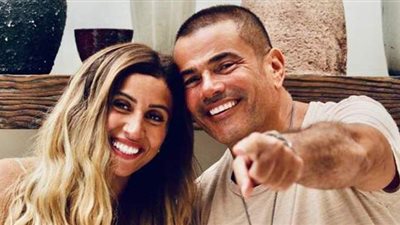 «فين ما تروح وراك».. دينا الشربيني وعمرو دياب يحتفلان برأس السنة في دبي | صور