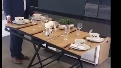 طاولة تتحول لقطعة أثاث أخرى دون إزالة ما عليها (فيديو)