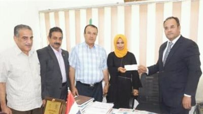 عاملة تفوز بشهادة أمان بقيمة 10 آلاف جنيه بالشرقية