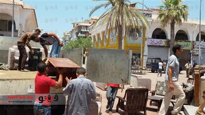 بالصور.. إزالة إشغالات الباعة الجائلين برأس البر