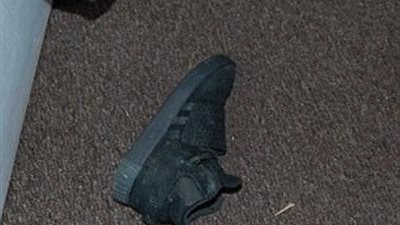 رجل يقتل ابن زوجته بسبب حذاء (صور)